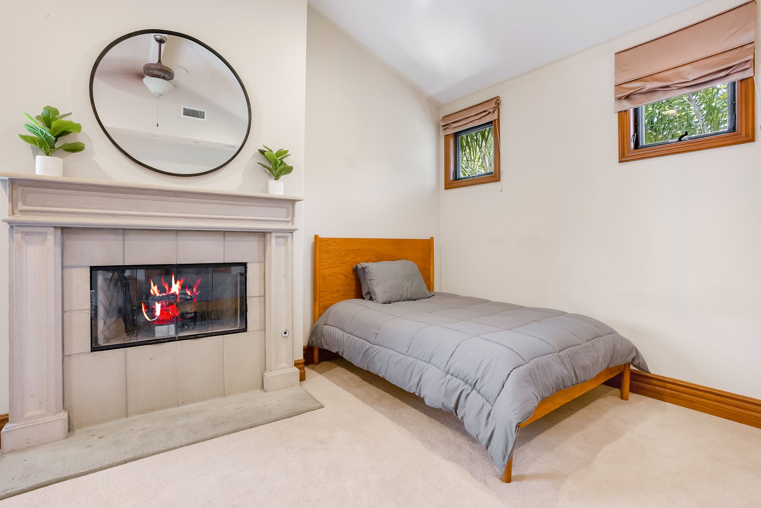 Bedroom with fireplace at South Shores Detox
