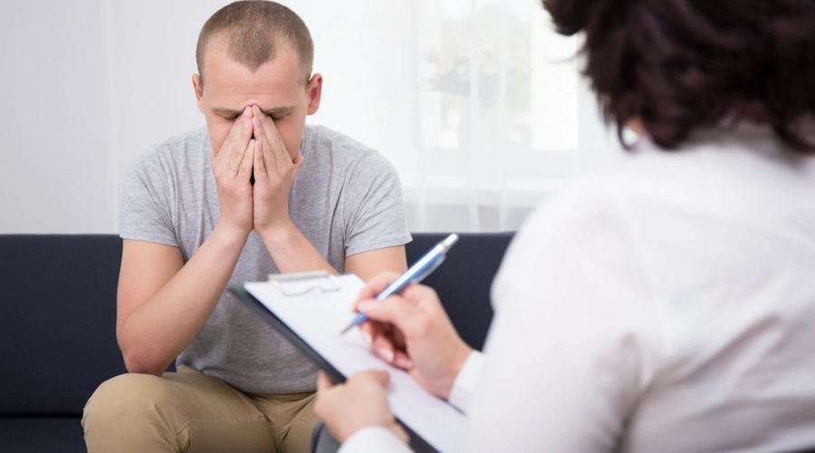 Patient and doctor in therapy displaying the Importance of a Personalized Treatment Plan