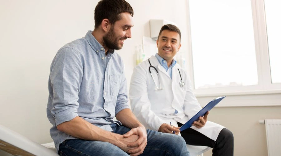 Patient in aftercare with doctor displaying professional treatment at rehab