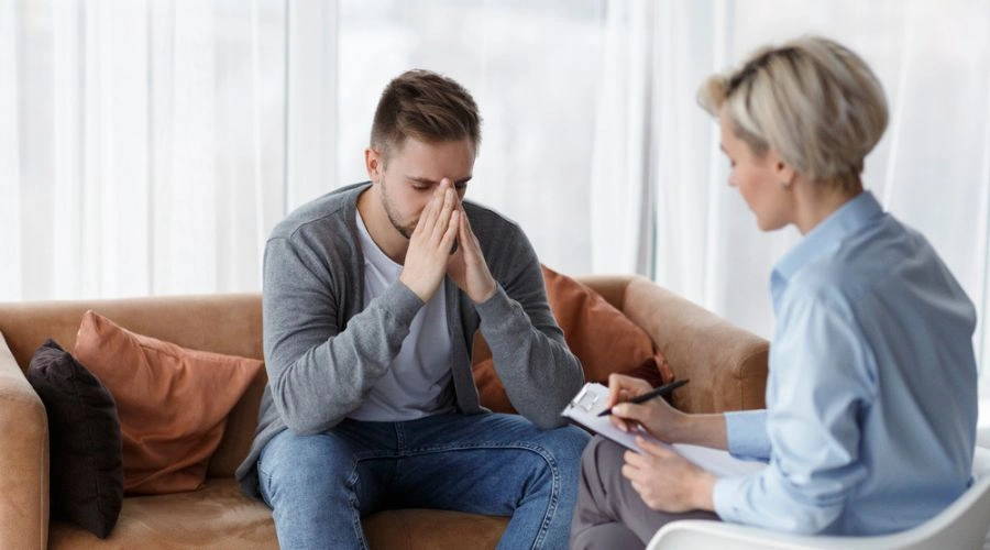 patient in sessions with physician seeking professional help to prevent relapse