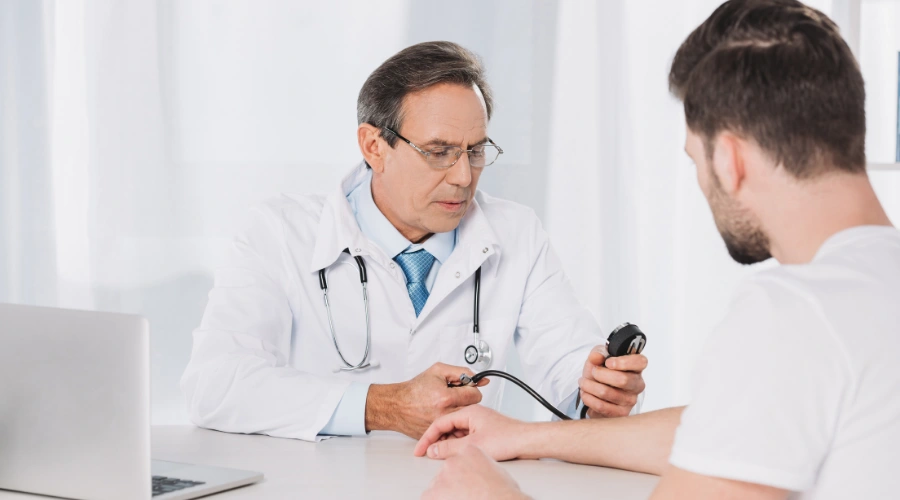 Image of a medical professional monitoring a patient during ketamine detox treatment