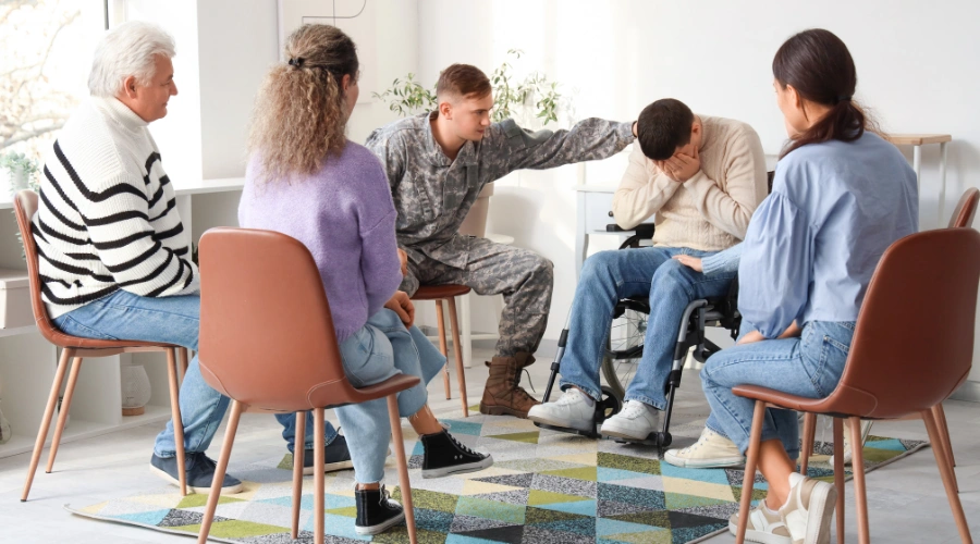 Image of a Airman attending a community support group meeting, symbolizing local recovery resources and continued support after rehab