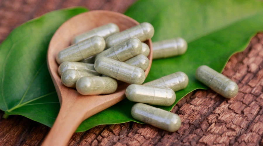 Image of synthetic kratom capusles highlighting the overdose risks linked to unregulated 7-Oh kratom items