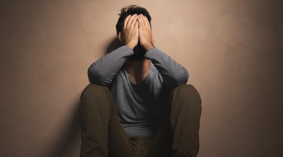 Image of ia man suffering from drug withdrawal symptoms linked to kratom shot dependence