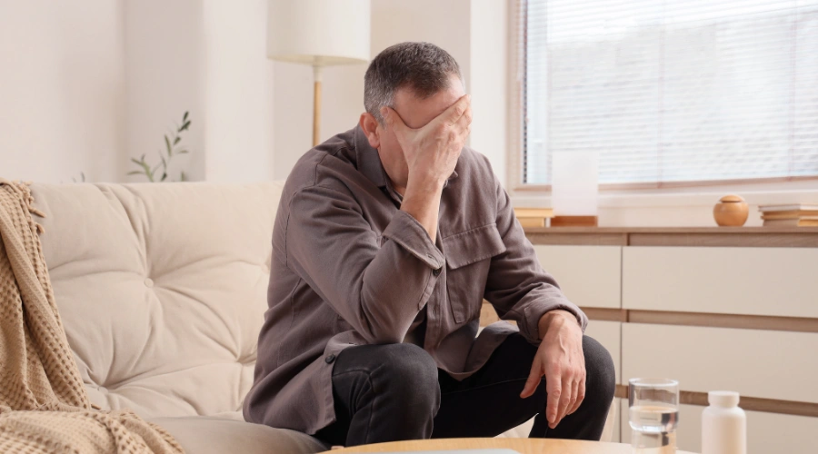 Image of a person experiencing physical side effects after using kratom concentrates